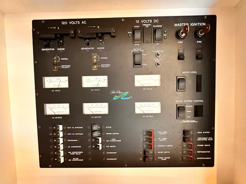 Slide: The Image of Control panel of a 1992 Sea Ray 400 Express Cruiser boat. - 19