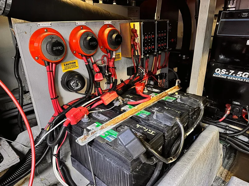 Slide: The Image of Engine room of 1992 Sea Ray 400 Express Cruiser with battery setup and wiring. - 22