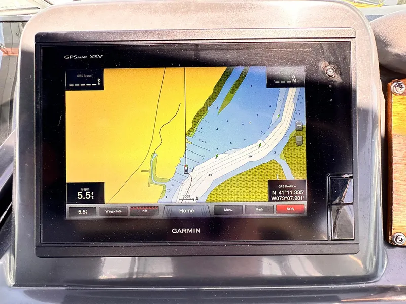 Slide: The Image of Garmin GPS display on 1992 Sea Ray 400 Express Cruiser showing navigation map. - 9