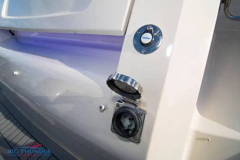 Slide: The Image of 2022 Scout 350 LXZ boat fuel cap and port detail. - 19