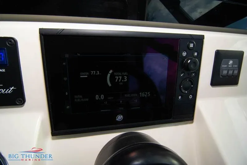 Slide: The Image of Dashboard of 2022 Scout 350 LXZ boat with digital display and controls. - 41
