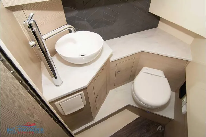 Slide: The Image of Modern bathroom in 2022 Scout 350 LXZ boat with sink and toilet. - 57