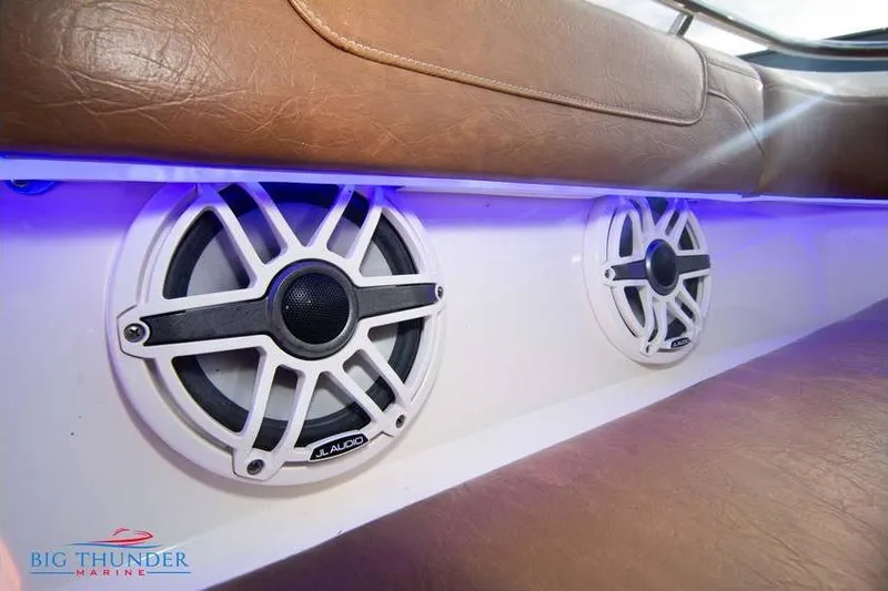 Slide: The Image of Speakers on 2022 Scout 350 LXZ boat with blue LED lighting. - 66