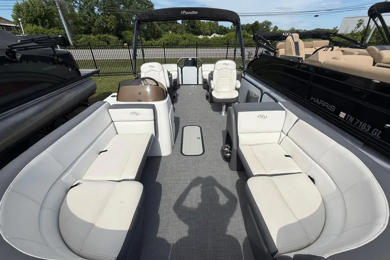 Slide: The Image of 2021 Manitou 22 Aurora LE Standard pontoon boat interior with spacious seating and modern design. - 9
