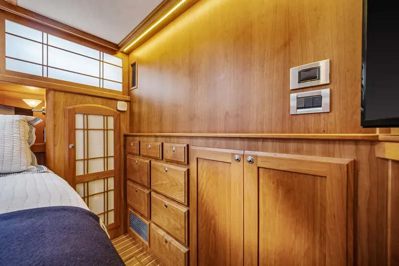 Slide: The Image of Luxurious wood interior of 2018 Sabre 48 Salon Express yacht cabin. - 51