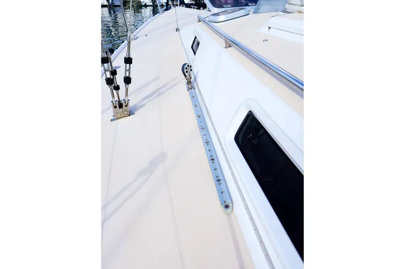 Slide: The Image of Deck view of a 2000 J Boats J/105 sailboat, featuring rigging and hardware. - 10