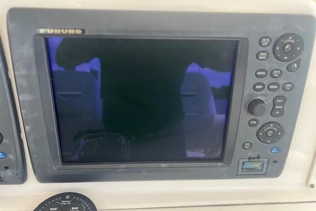 Slide: The Image of Furuno marine display on 2011 Everglades 350LX boat dashboard. - 14