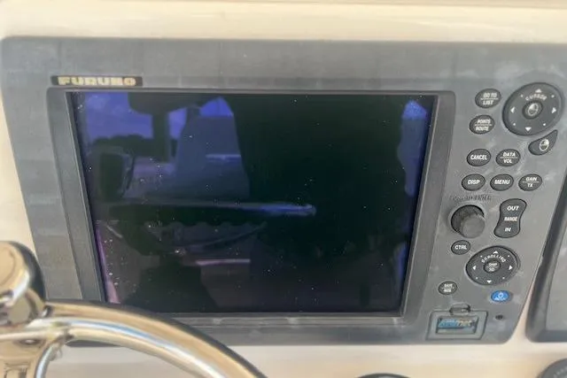 Slide: The Image of Furuno marine display on 2011 Everglades 350LX boat dashboard. - 15