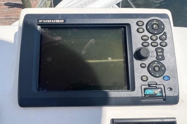 Slide: The Image of Furuno navigation system on 2011 Everglades 350LX boat dashboard. - 29