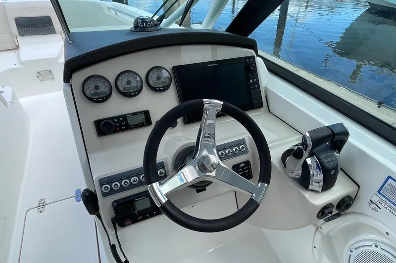 Slide: The Image of Boston Whaler 27 DC- Helm - 16