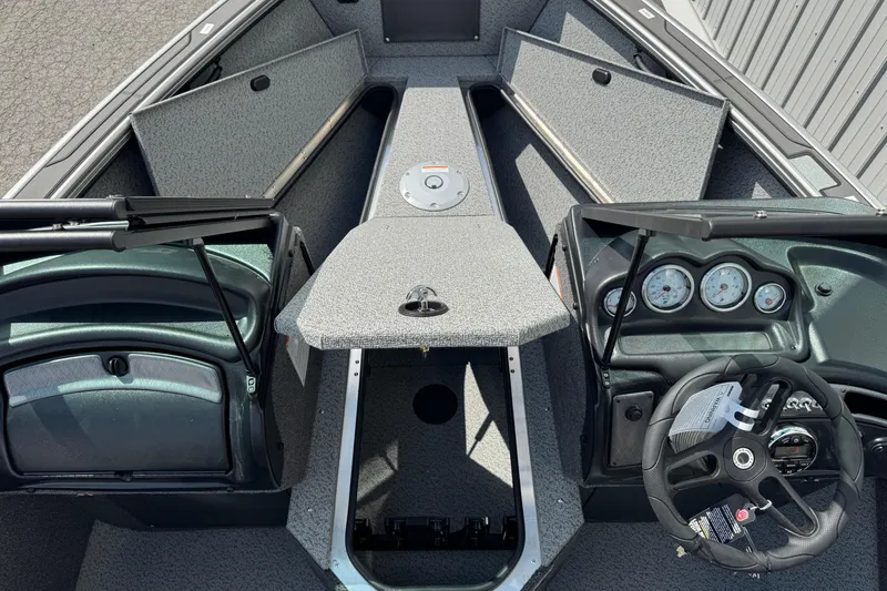 Slide: The Image of 2026 Lund 1875 Fisherman boat interior with dashboard and seating compartments. - 4