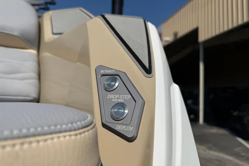 Slide: The Image of 2026 Supra SL 450 interior detail with retractable drop step controls. - 15