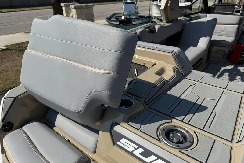Slide: The Image of 2026 Supra SL 450 boat interior with gray seating and modern design elements. - 21