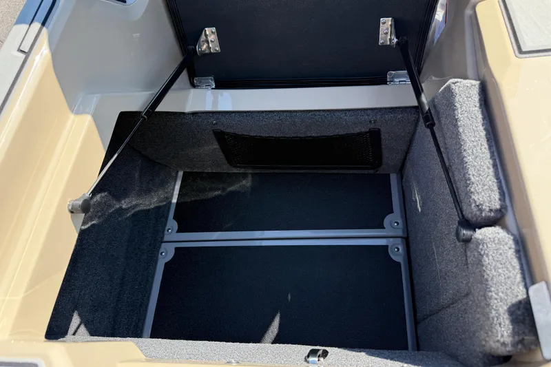 Slide: The Image of 2026 Supra SL 450 storage compartment with open lid, showcasing spacious interior design. - 23