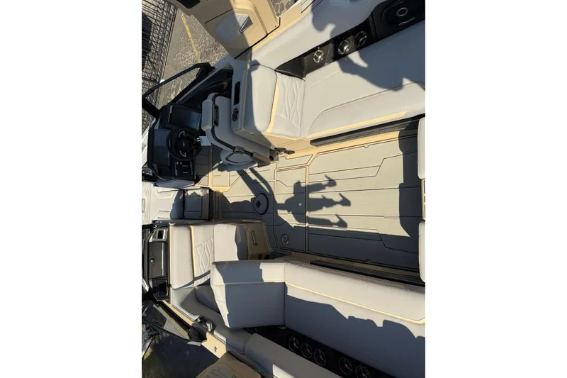 Slide: The Image of 2026 Supra SL 450 boat interior with luxurious seating and modern design. - 25