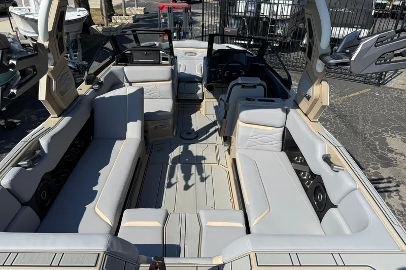 Slide: The Image of 2026 Supra SL 450 boat interior with luxurious seating and modern design. - 26