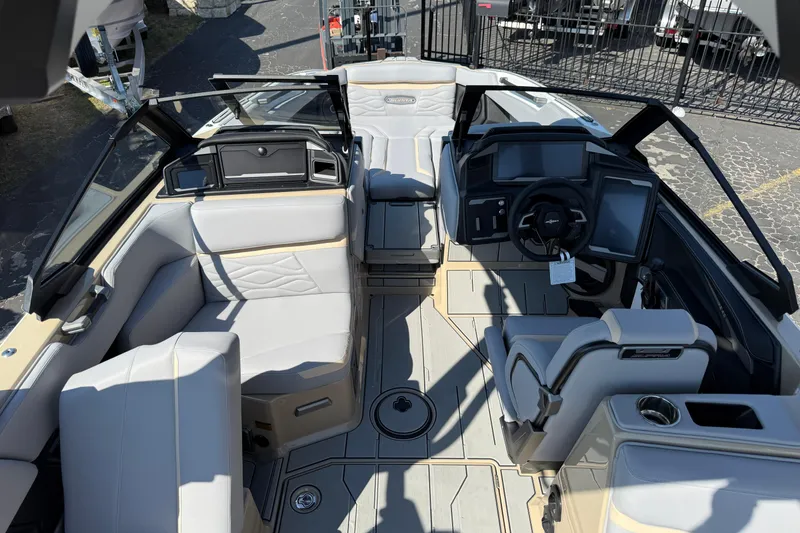 Slide: The Image of 2026 Supra SL 450 boat interior with modern seating and advanced dashboard controls. - 27