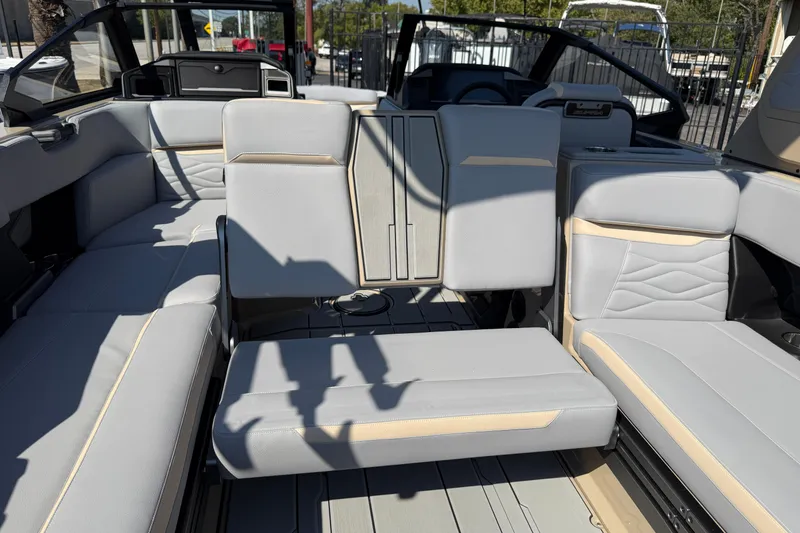 Slide: The Image of 2026 Supra SL 450 boat interior with luxurious gray seating and modern design. - 32
