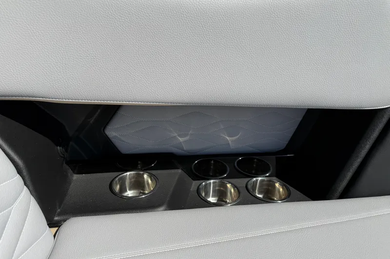 Slide: The Image of 2026 Supra SL 450 interior with sleek cup holders and quilted leather detailing. - 37