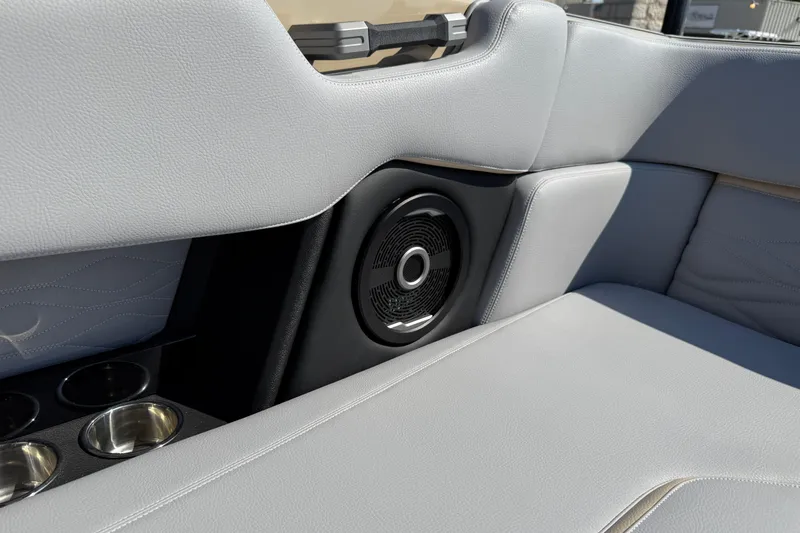 Slide: The Image of 2026 Supra SL 450 interior with sleek gray upholstery and integrated speaker system. - 38