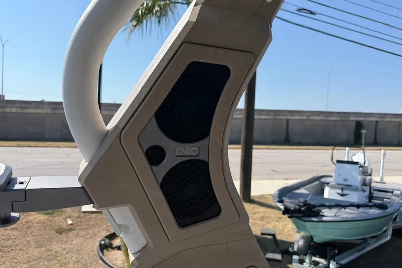 Slide: The Image of Close-up of 2026 Supra SL 450 boat speaker system with a boat in the background. - 50