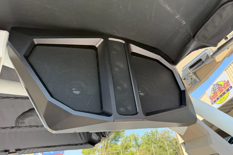 Slide: The Image of 2026 Supra SL 450 boat speakers under canopy, showcasing modern audio design. - 52