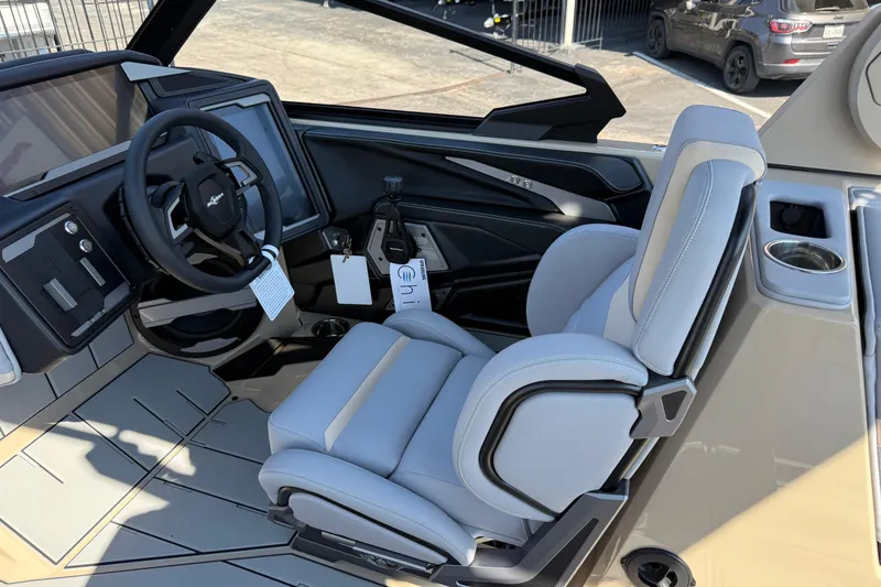 Slide: The Image of 2026 Supra SL 450 boat interior with modern steering and luxurious seating. - 55