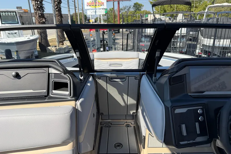 Slide: The Image of 2026 Supra SL 450 boat interior with modern dashboard and seating. - 68