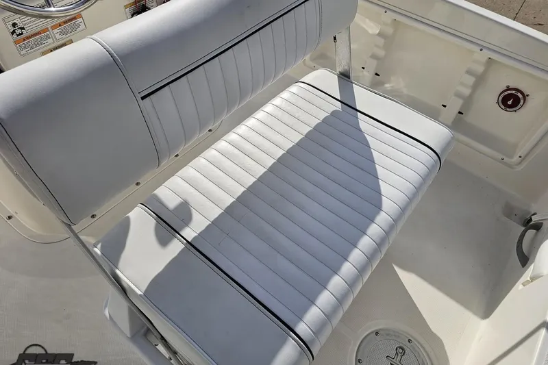 Slide: The Image of White seating on 2016 Bayliner Element F18 boat, featuring sleek design and comfortable upholstery. - 54