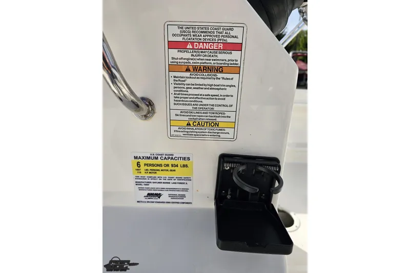 Slide: The Image of 2016 Bayliner Element F18 safety and capacity labels, maximum 6 persons or 934 lbs. - 71