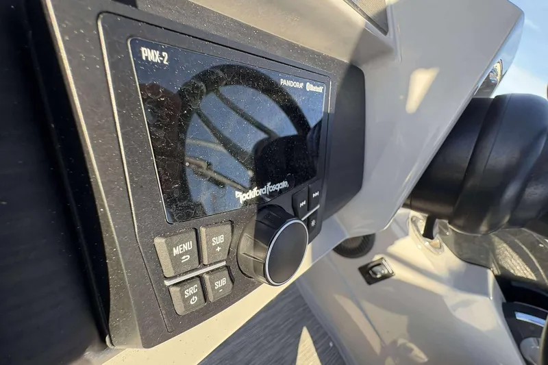 Slide: The Image of Close-up of a Rockford Fosgate PMX-2 stereo on a 2021 Bennington 27RX boat. - 14