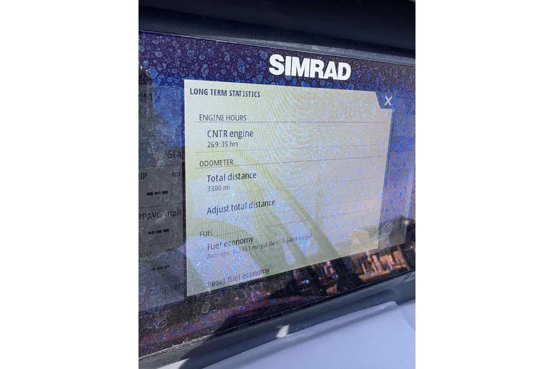 Slide: The Image of Simrad display showing engine statistics for 2021 Bennington 27RX boat. - 15
