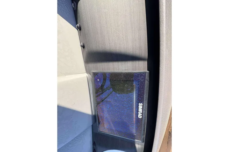 Slide: The Image of Simrad display on 2021 Bennington 27RX boat dashboard. - 23