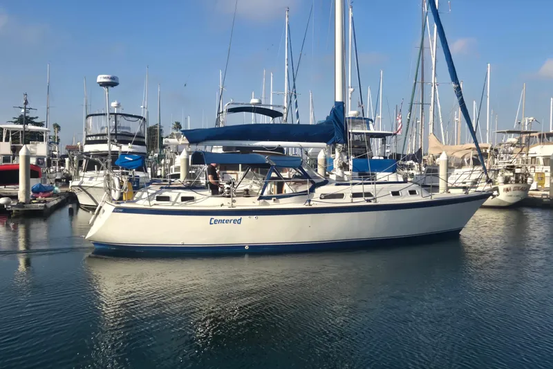 The Image of 1979 O'Day 37 Center Cockpit sailboat docked in a marina. - 0