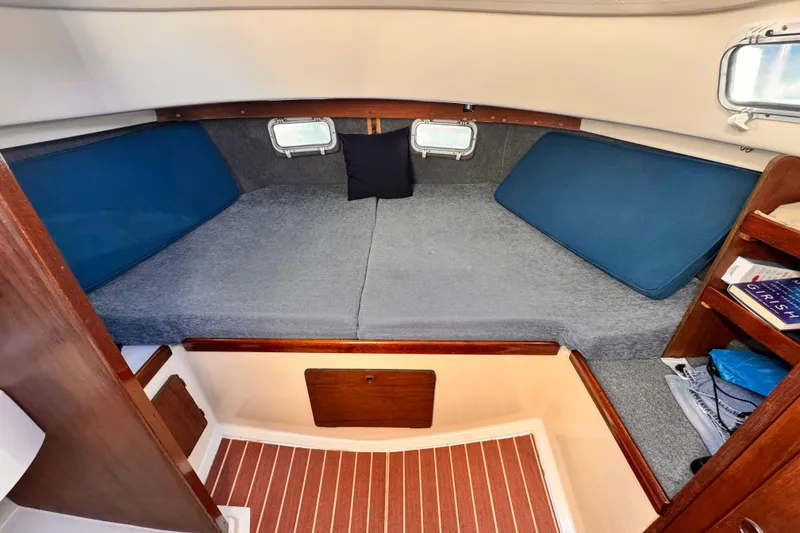 Slide: The Image of Cozy cabin interior of 1979 O'Day 37 Center Cockpit sailboat with comfortable bedding. - 14