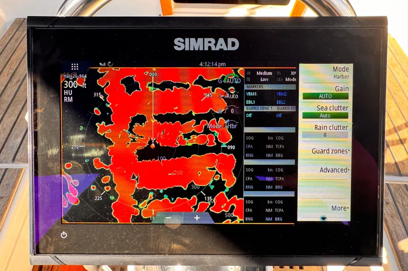 Slide: The Image of Simrad marine radar display on 1979 O'Day 37 Center Cockpit sailboat, showing navigation data. - 19