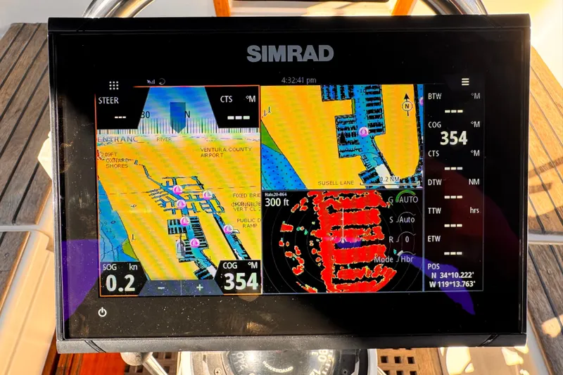 Slide: The Image of Simrad navigation display on 1979 O'Day 37 Center Cockpit sailboat, showing nautical charts and radar. - 20