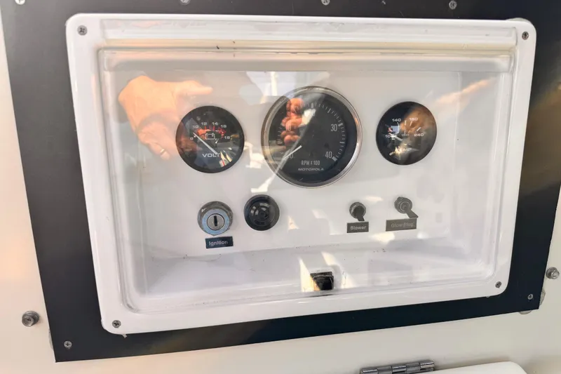 Slide: The Image of 1979 O'Day 37 Center Cockpit control panel with gauges and switches. - 22