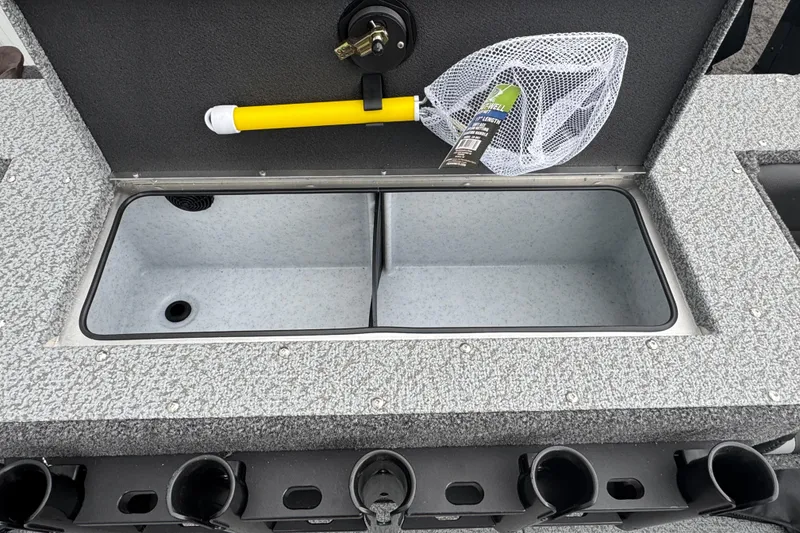 Slide: The Image of 2026 Lund 2075 Fisherman boat livewell with net and rod holders. - 11