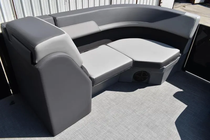 Slide: The Image of 2026 Lowe LS 170 boat interior with gray seating and sleek design. - 13