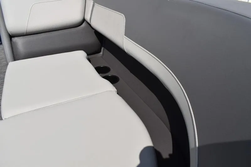 Slide: The Image of 2026 Lowe LS 170 boat seating with gray and white upholstery, featuring modern design. - 18