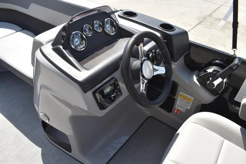 Slide: The Image of Control panel of 2026 Lowe LS 170 boat with capacity label. - 27