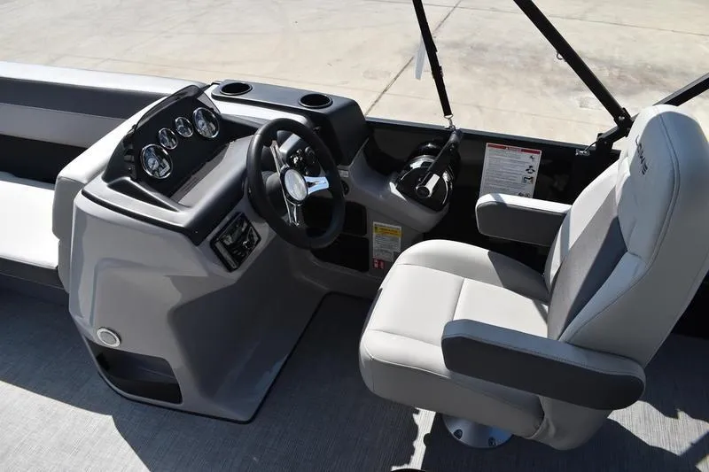 Slide: The Image of Control panel of Lowe LS 170 boat, 2026 model, with seating capacity label. - 28