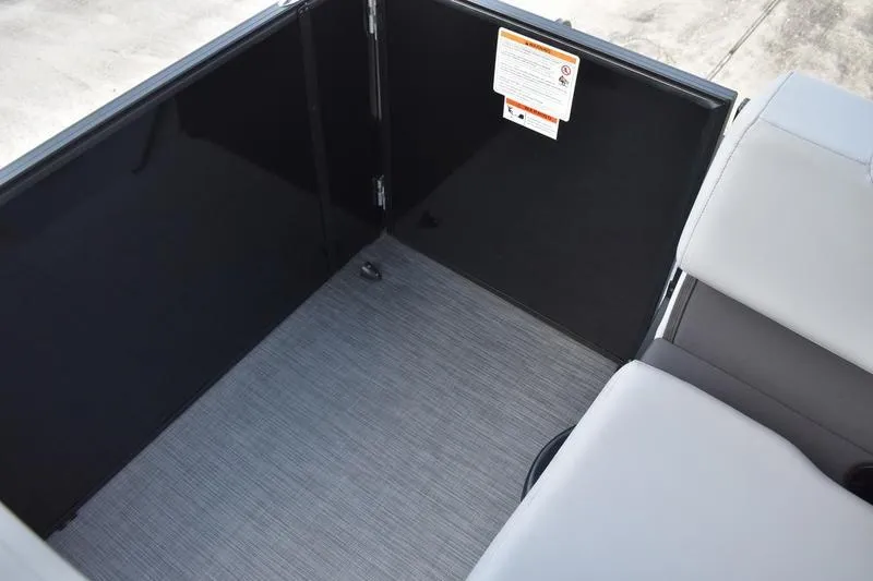 Slide: The Image of Interior of 2026 Lowe LS 170 boat with seating and storage area. - 40