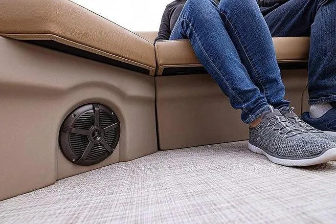 Slide: The Image of Interior of 2026 Lowe LS 170 boat with seating and speaker detail. - 3