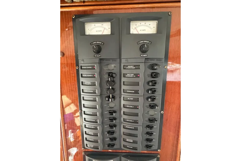 Slide: The Image of Electrical control panel on a 2002 Riviera 40 Flybridge yacht. - 26