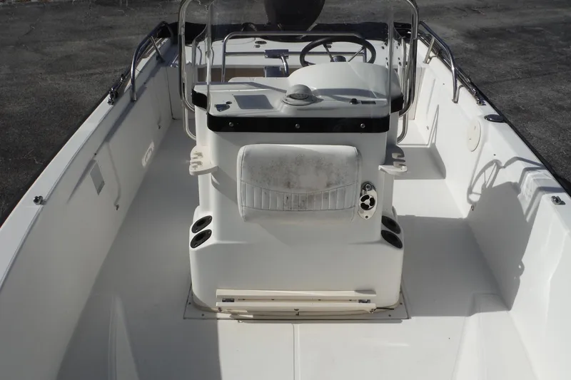 Slide: The Image of 2007 Boston Whaler 180 Dauntless boat interior with steering console and seating. - 10