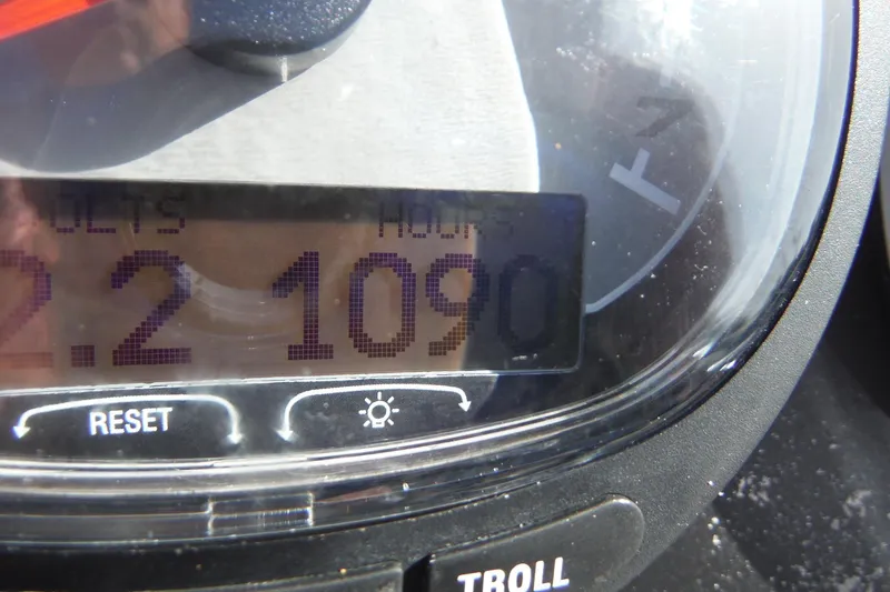 Slide: The Image of Close-up of a 2007 Boston Whaler 180 Dauntless boat gauge showing 1090 hours. - 18