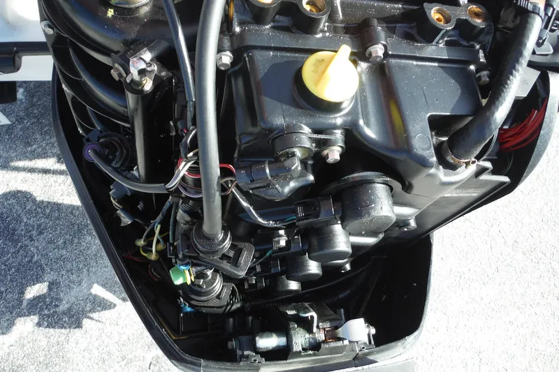 Slide: The Image of Close-up of a 2007 Boston Whaler 180 Dauntless boat engine components. - 23