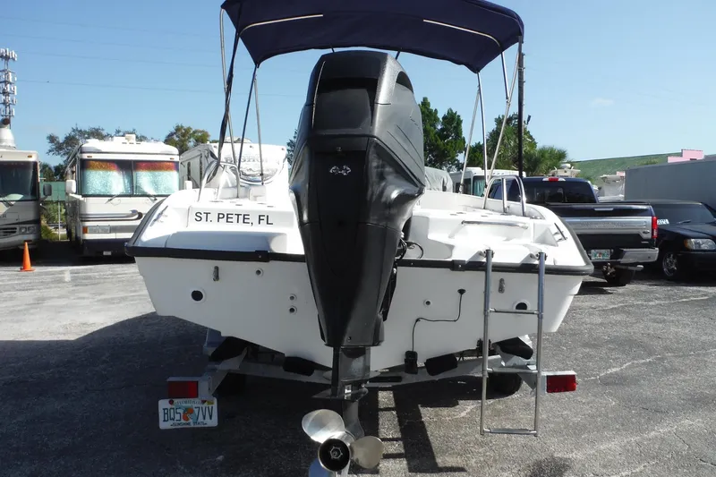 Slide: The Image of 2007 Boston Whaler 180 Dauntless boat with outboard motor, parked in St. Pete, FL. - 31